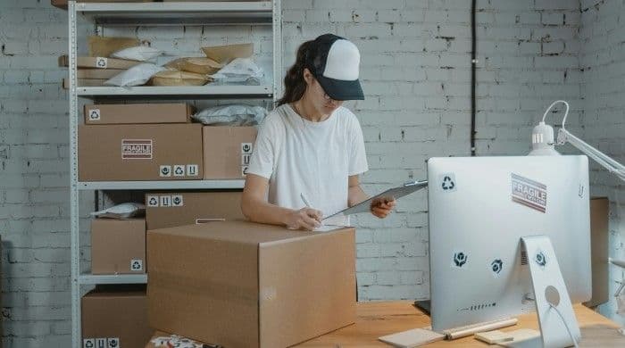 Women with a shipping box